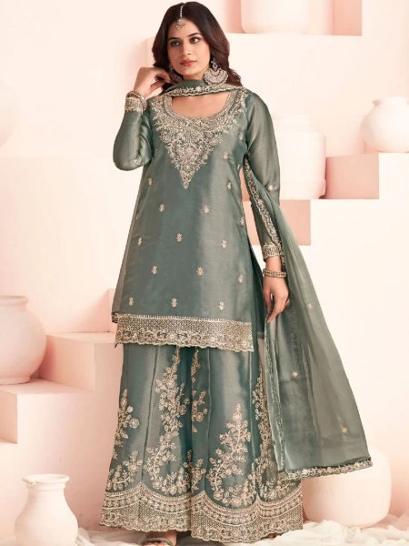 Alluring Haseena series Green moss silk palazzo suit With heavy embroidery.  Salwar Kameez