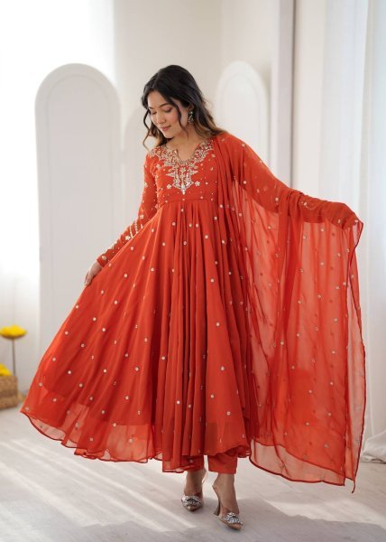 Alluring Orange Faux Georgette Gown with Heavy Embroidery Work For Diwali Festival Ready To Wear Collection
