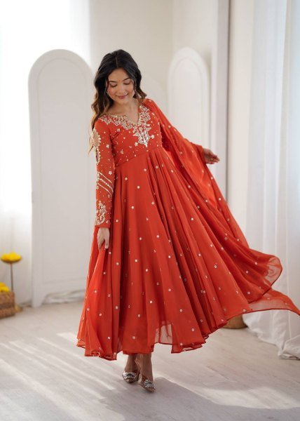 Alluring Orange Faux Georgette Gown with Heavy Embroidery Work For Diwali Festival Ready To Wear Collection