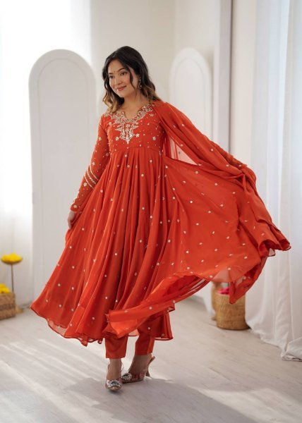 Alluring Orange Faux Georgette Gown with Heavy Embroidery Work For Diwali Festival Ready To Wear Collection