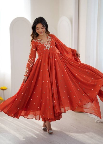 Alluring Orange Faux Georgette Gown with Heavy Embroidery Work For Diwali Festival Ready To Wear Collection