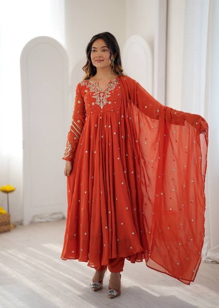 Alluring Orange Faux Georgette Gown with Heavy Embroidery Work For Diwali Festival Ready To Wear Collection