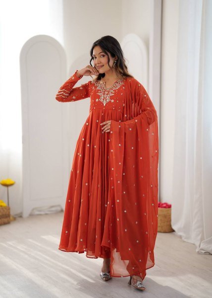 Alluring Orange Faux Georgette Gown with Heavy Embroidery Work For Diwali Festival Ready To Wear Collection