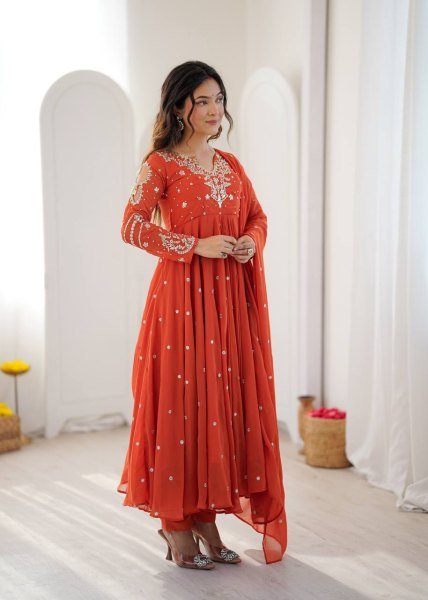 Alluring Orange Faux Georgette Gown with Heavy Embroidery Work For Diwali Festival Ready To Wear Collection