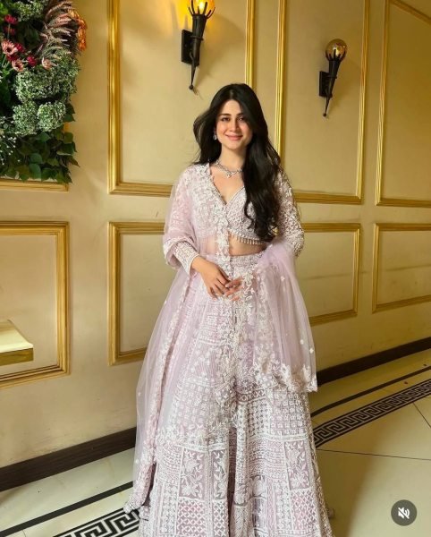 Artistic Baby Pink Party Wear Net Lehenga with Sequin Work and Can Can Flair Designer Lehenga Choli