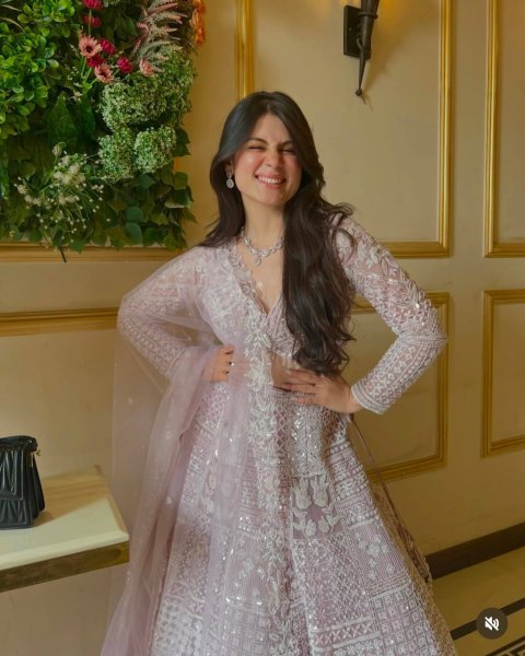 Artistic Baby Pink Party Wear Net Lehenga with Sequin Work and Can Can Flair Designer Lehenga Choli