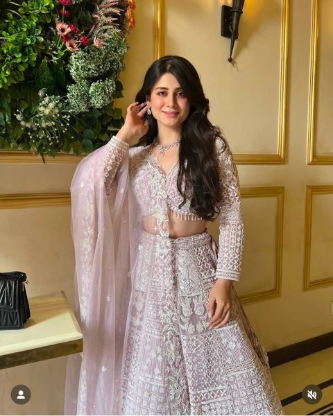 Artistic Baby Pink Party Wear Net Lehenga with Sequin Work and Can Can Flair Designer Lehenga Choli