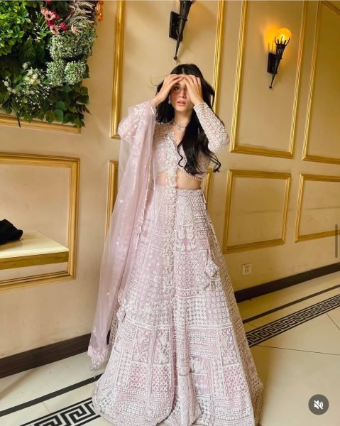 Artistic Baby Pink Party Wear Net Lehenga with Sequin Work and Can Can Flair Designer Lehenga Choli