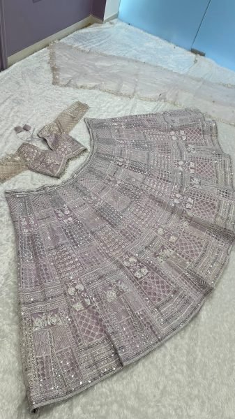 Artistic Baby Pink Party Wear Net Lehenga with Sequin Work and Can Can Flair Designer Lehenga Choli