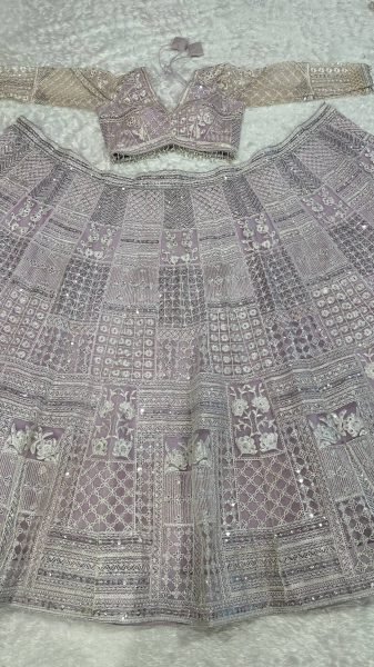 Artistic Baby Pink Party Wear Net Lehenga with Sequin Work and Can Can Flair Designer Lehenga Choli