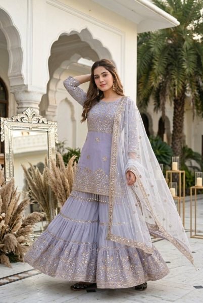 Artistic Lavender Heavy Embroidered Faux Georgette Top with Fancy Latkan Detailing Ready To Wear Collection