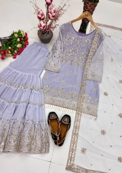 Artistic Lavender Heavy Embroidered Faux Georgette Top with Fancy Latkan Detailing Ready To Wear Collection
