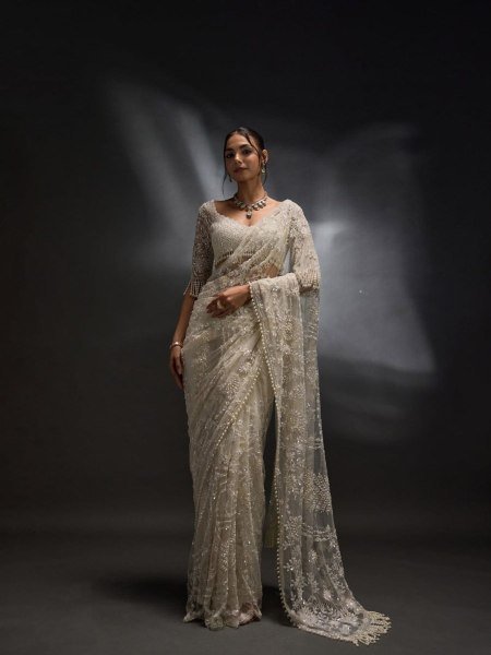 Attractive White Net Saree With Sequins And Stones Embroidery For Reception Sarees 
