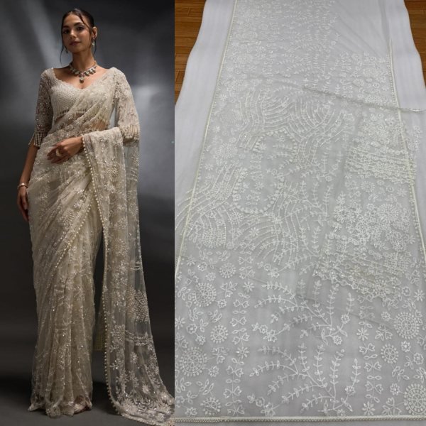 Attractive White Net Saree With Sequins And Stones Embroidery For Reception Bollywood Fancy Sarees Wholesale