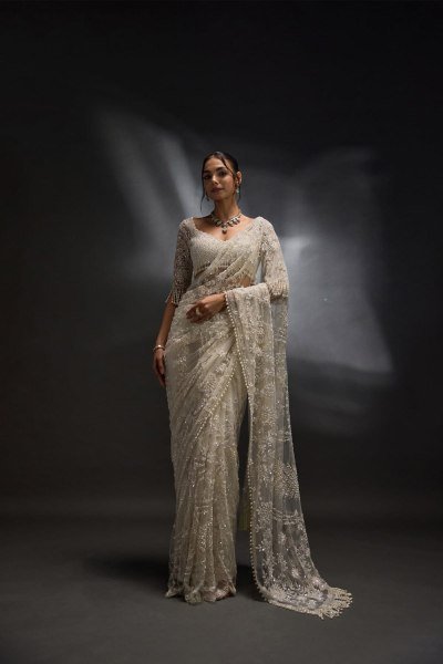 Attractive White Net Saree With Sequins And Stones Embroidery For Reception Bollywood Fancy Sarees Wholesale