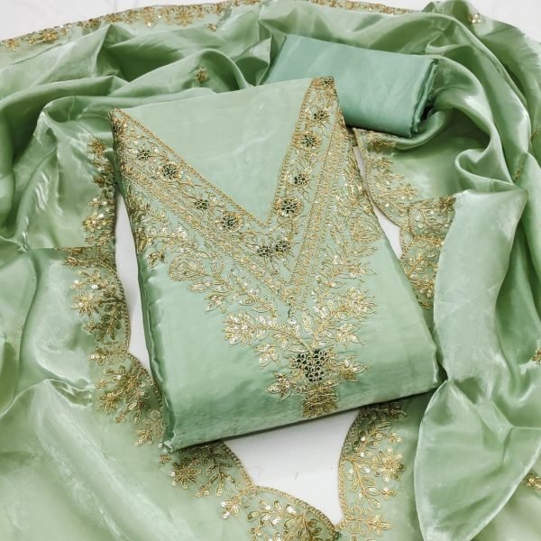 Authentic Green Fashionable Dress Material with Premium Look in Budget Punjabi Dress Materials Wholesale