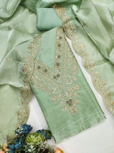 Authentic Green Fashionable Dress Material with Premium Look in Budget Punjabi Dress Materials Wholesale