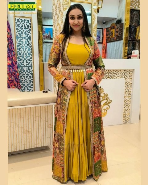 Authentic Yellow Faux Georgette Ruffle Flair Gown with Printed Crepe Koti At Manufacturer Rate  Ready To Wear Collection