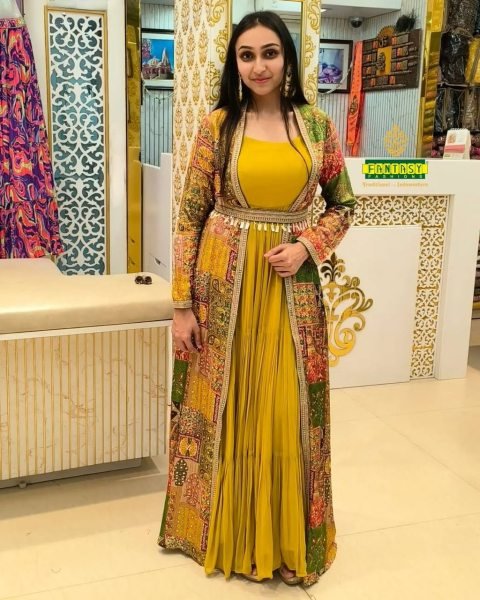 Authentic Yellow Faux Georgette Ruffle Flair Gown with Printed Crepe Koti At Manufacturer Rate  Ready To Wear Collection