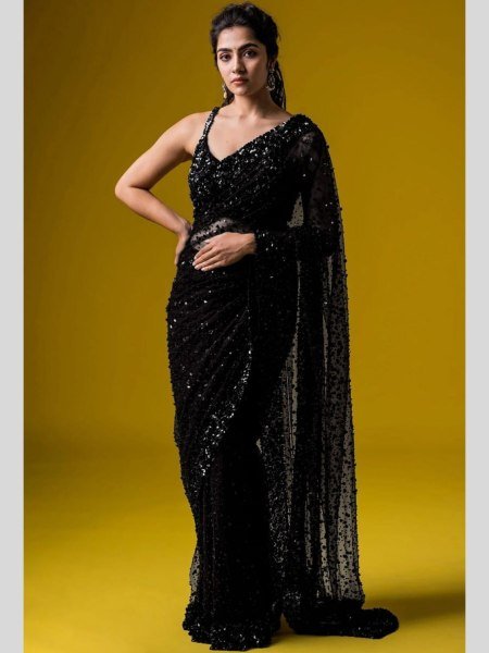 Black Sequins Saree With A Heavily Embroidered Blouse 