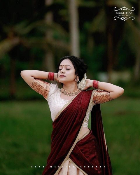 Bohemian Cream Onam Festival Jacquard Lehenga Choli with Chik Golden Patti Design Half Saree Lehenga