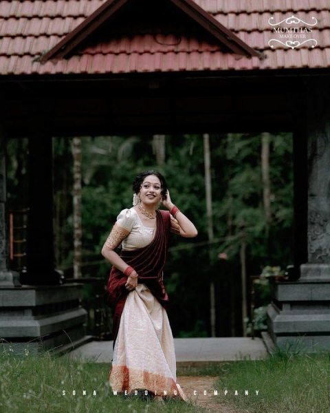 Bohemian Cream Onam Festival Jacquard Lehenga Choli with Chik Golden Patti Design Half Saree Lehenga