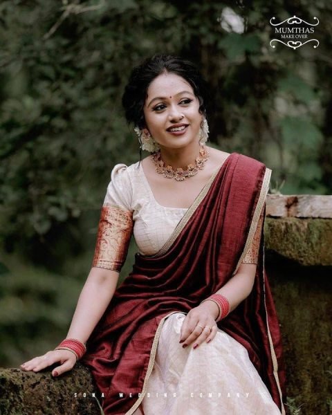 Bohemian Cream Onam Festival Jacquard Lehenga Choli with Chik Golden Patti Design Half Saree Lehenga