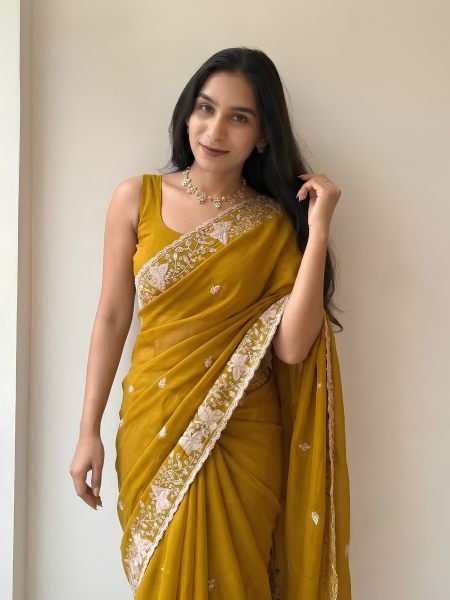 Bohemian Yellow Pure Star Georgette Saree with Cutwork Border and Embroidered Blouse