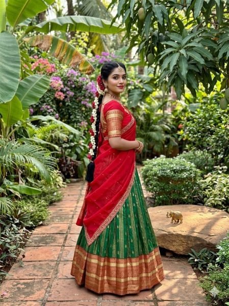 Charismatic Green Kanchipuram Silk Lehenga with Contrast Red Blouse And Dupatta Half Saree Lehenga
