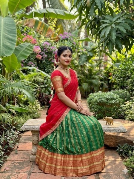 Charismatic Green Kanchipuram Silk Lehenga with Contrast Red Blouse And Dupatta Half Saree Lehenga