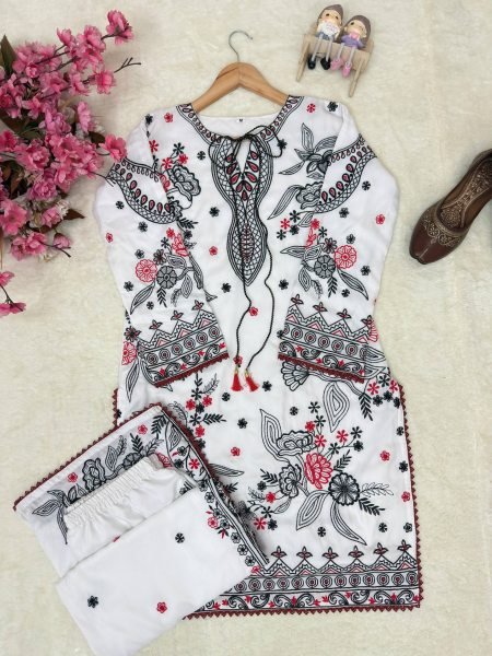 Charismatic White Kurti Palazzo Set with Thread Embroidery and Latkan Neck CO ORD Sets
