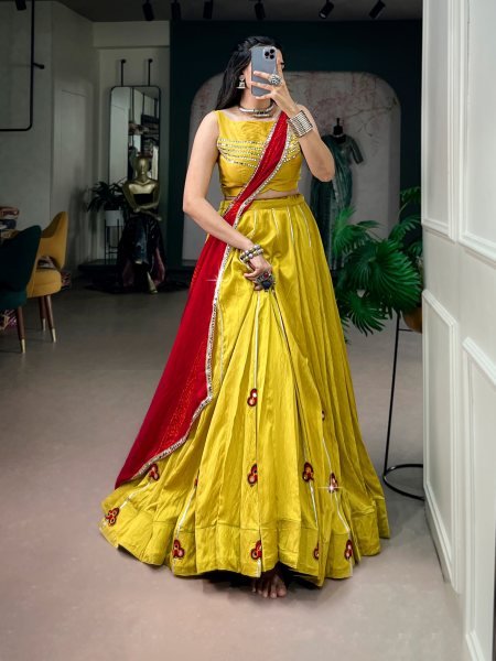 Charismatic Yellow Chanderi Lehenga with Mirror Gamthi Patches and Gotta Patti Lace Navratri Lehnega Choli