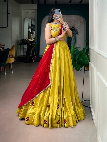 Charismatic Yellow Chanderi Lehenga with Mirror Gamthi Patches and Gotta Patti Lace Navratri Lehnega Choli