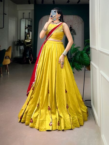 Charismatic Yellow Chanderi Lehenga with Mirror Gamthi Patches and Gotta Patti Lace Navratri Lehnega Choli