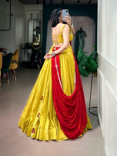 Charismatic Yellow Chanderi Lehenga with Mirror Gamthi Patches and Gotta Patti Lace Navratri Lehnega Choli