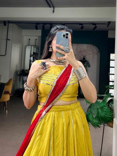 Charismatic Yellow Chanderi Lehenga with Mirror Gamthi Patches and Gotta Patti Lace Navratri Lehnega Choli