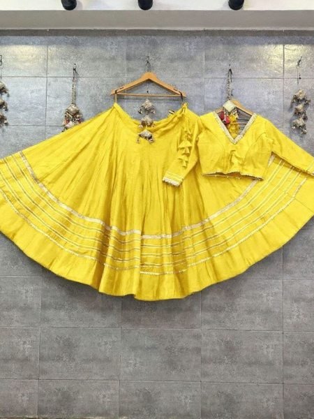 Charismatic Yellow Rayon Cotton Navratri Lehenga Choli with Heavy Lace Work Shop by Occasion