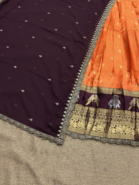 Charming Orange Gadhwal Silk Lehenga Choli with Zari Weaving and Embroidered Dupatta Half Saree Lehenga