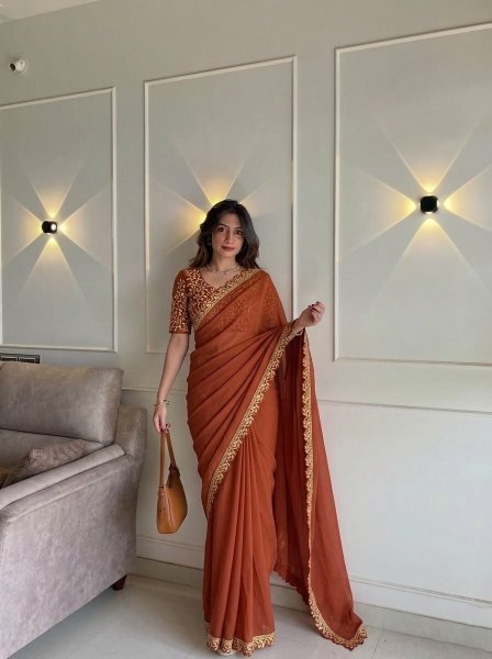 Classy Orange Soft Rangoli Silk Saree with Cutwork Lace Border for Special Occasions Embroidery Sarees Wholesale