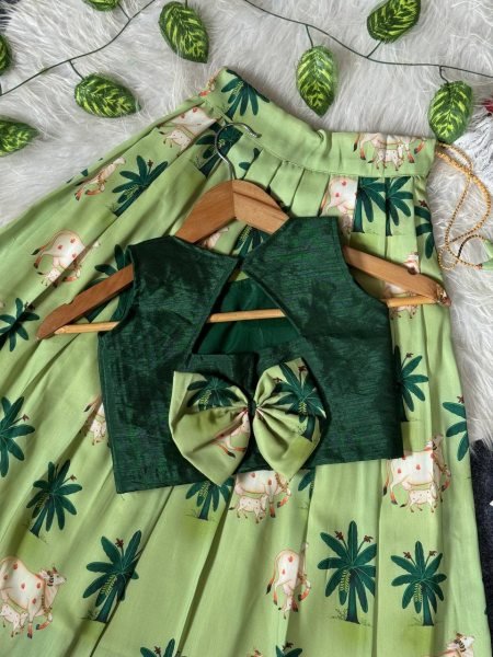 Contemporary Green Soft Muslin Lehenga Choli with Cute Cow Print for Summer Festive Wear Girls Wear