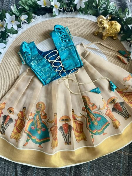Cream Golden Girls Lehenga with Sky Blue Banarasi Brocade Blouse for Onam Girls Wear