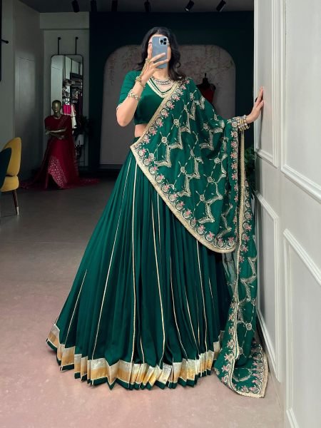 Dapper Dark Green Georgette Lehenga Choli with Embossed Lace Detailing for Navratri  Wholesale Lehengas Suppliers in Germany