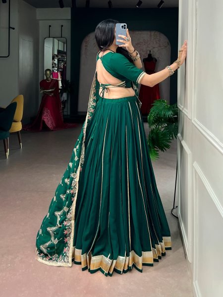 Dapper Dark Green Georgette Lehenga Choli with Embossed Lace Detailing for Navratri  Navratri Lehnega Choli