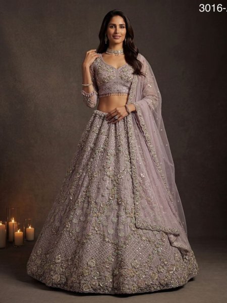 Dapper Lavender Heavily Embroidered Soft Net Lehenga Choli with Glitter Dori Work  Lehenga