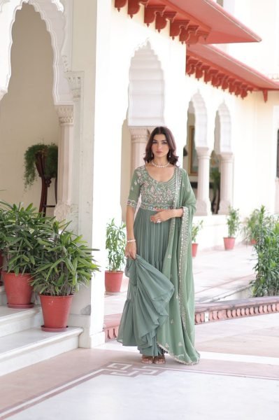 Dazzling Pista Green Embroidered Faux Blooming Gown with 12 Meter Flair and Designer Dupatta at Party Wear Anarkali Kurtis 