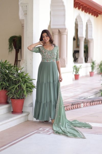 Dazzling Pista Green Embroidered Faux Blooming Gown with 12 Meter Flair and Designer Dupatta at Party Wear Anarkali Kurtis 