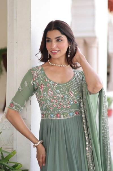 Dazzling Pista Green Embroidered Faux Blooming Gown with 12 Meter Flair and Designer Dupatta at Party Wear Anarkali Kurtis 