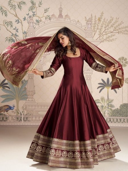 Dynamic Maroon Heavy Vichitra Silk Gown with Sequins Zari Embroidery and Banarasi Dupatta 