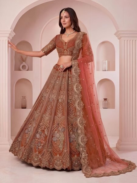 Efficient Orange Peacock Pattern Net Lehenga Choli with Sequins and Zari Embroidery 