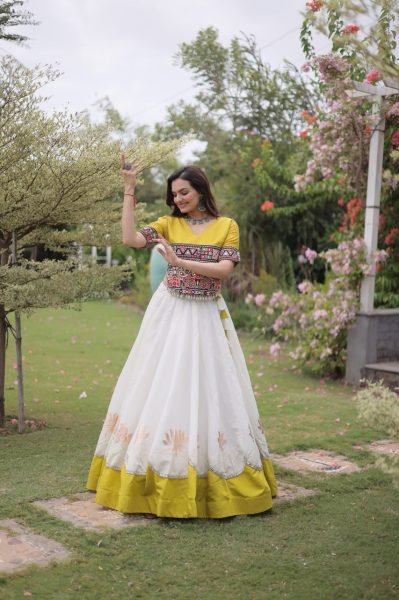 Ethereal White Yellow Roman Fabric Garba Lehenga Choli with Mirror Lace Design Navratri Lehnega Choli